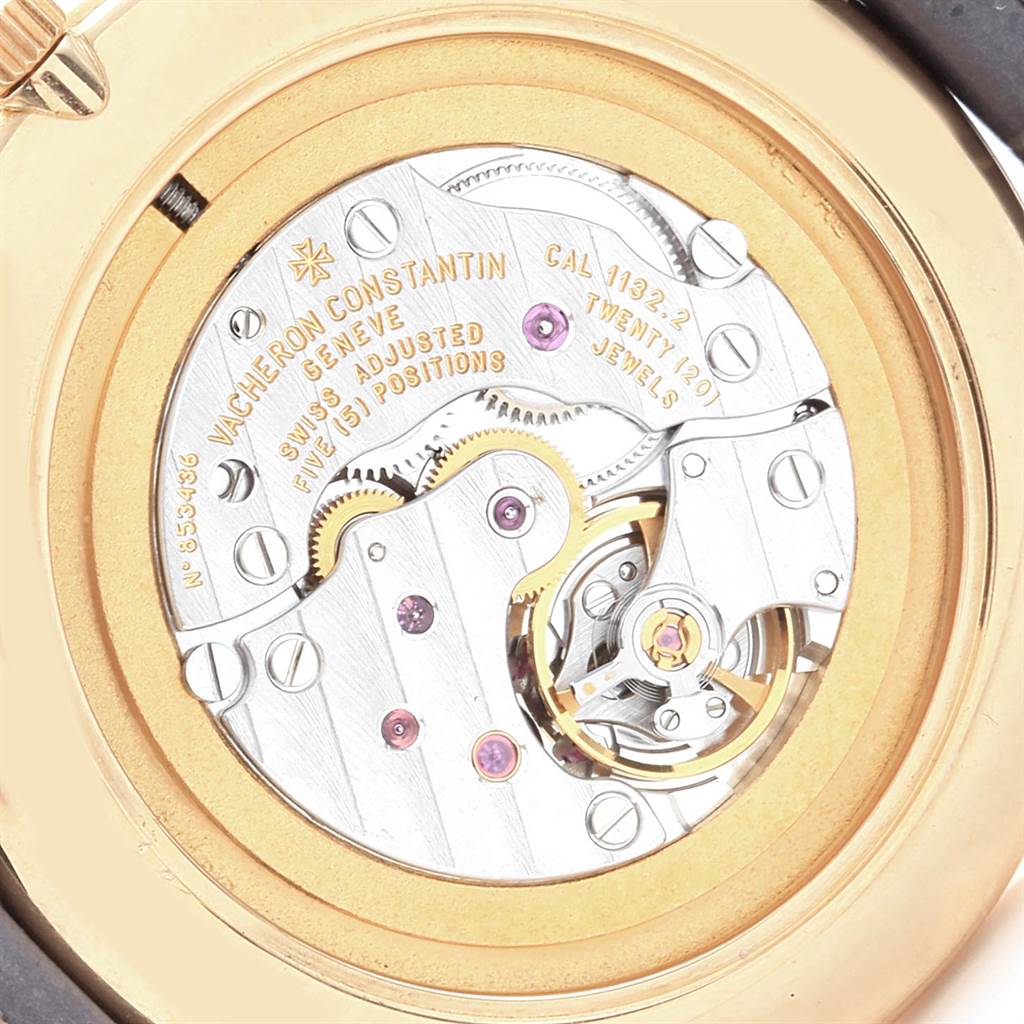 The image shows the detailed movement and inner workings of the Vacheron Constantin Patrimony 31160 Men's Yellow Gold White Dial 31160 Men's Yellow Gold White Dial model.