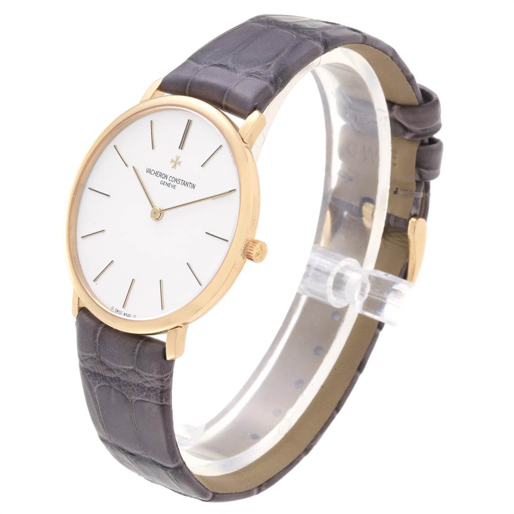 The image shows a Vacheron Constantin Patrimony 31160 Men's Yellow Gold White Dial 31160 Men's Yellow Gold White Dial watch with a side angle, displaying the watch face, bezel, crown, and leather strap.