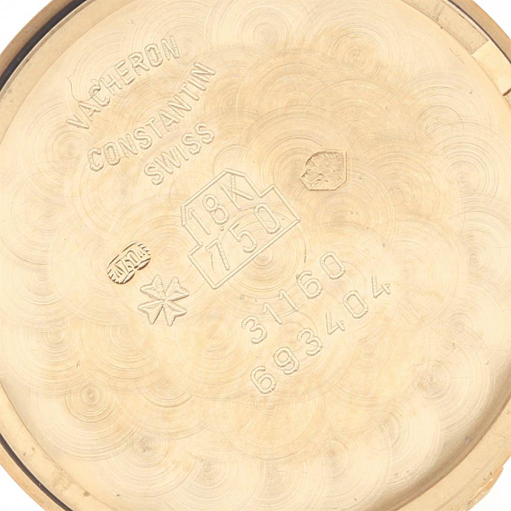 This image shows the inner case back of the Vacheron Constantin Patrimony 31160 Men's Yellow Gold White Dial 31160 Men's Yellow Gold White Dial watch, revealing its gold content and hallmark stamps.