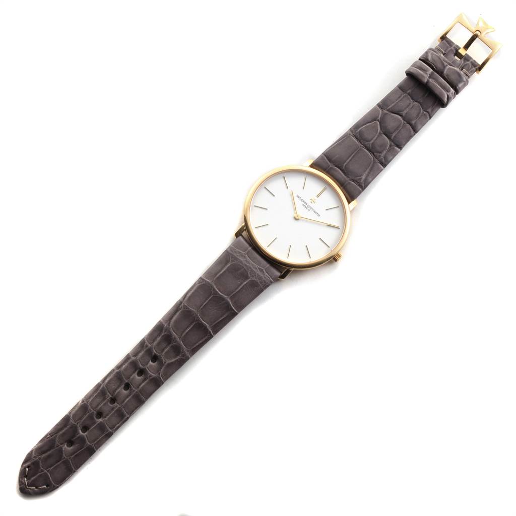 The Vacheron Constantin Patrimony 31160 Men's Yellow Gold White Dial 31160 Men's Yellow Gold White Dial watch is shown in a top-down angle, displaying the entire watch including the dial and leather strap.