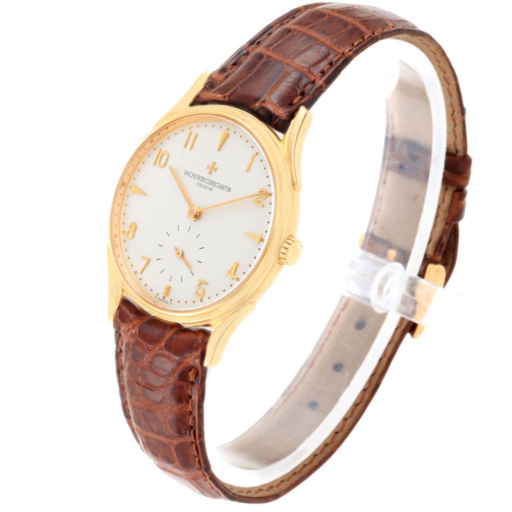 This image shows the Vacheron Constantin Historiques 92239 Men's Yellow Gold Silver Dial 92239 Men's Yellow Gold Silver Dial model at a slight angle, highlighting the gold case, white dial, and brown leather strap.