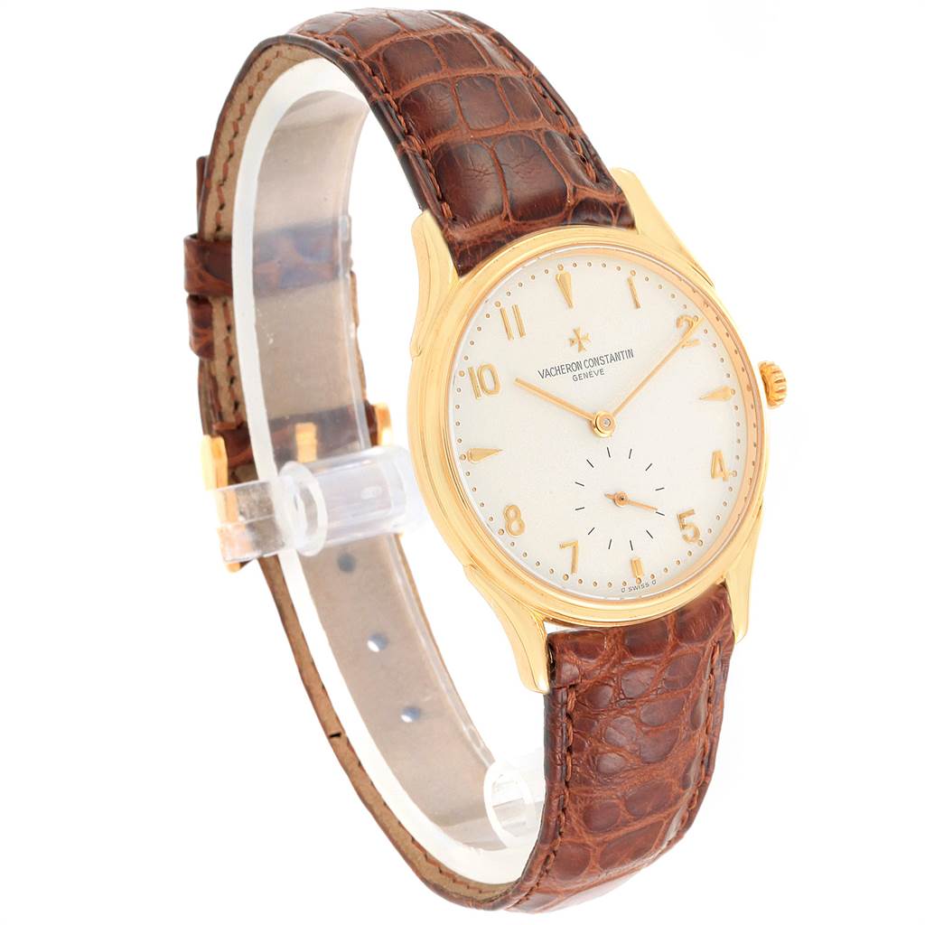 The Vacheron Constantin Historiques 92239 Men's Yellow Gold Silver Dial 92239 Men's Yellow Gold Silver Dial watch is shown at a three-quarter angle, highlighting its gold case, white dial, and brown leather strap.