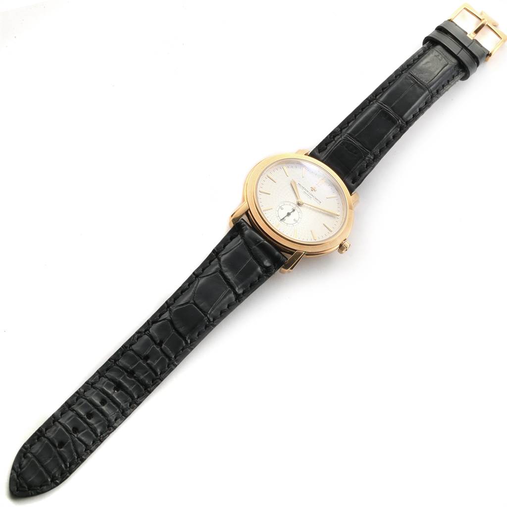 The image shows a Vacheron Constantin Malte 81000 Men's Yellow Gold Silver Dial 81000 Men's Yellow Gold Silver Dial watch from a top-down angle, displaying the face, strap, and buckle.