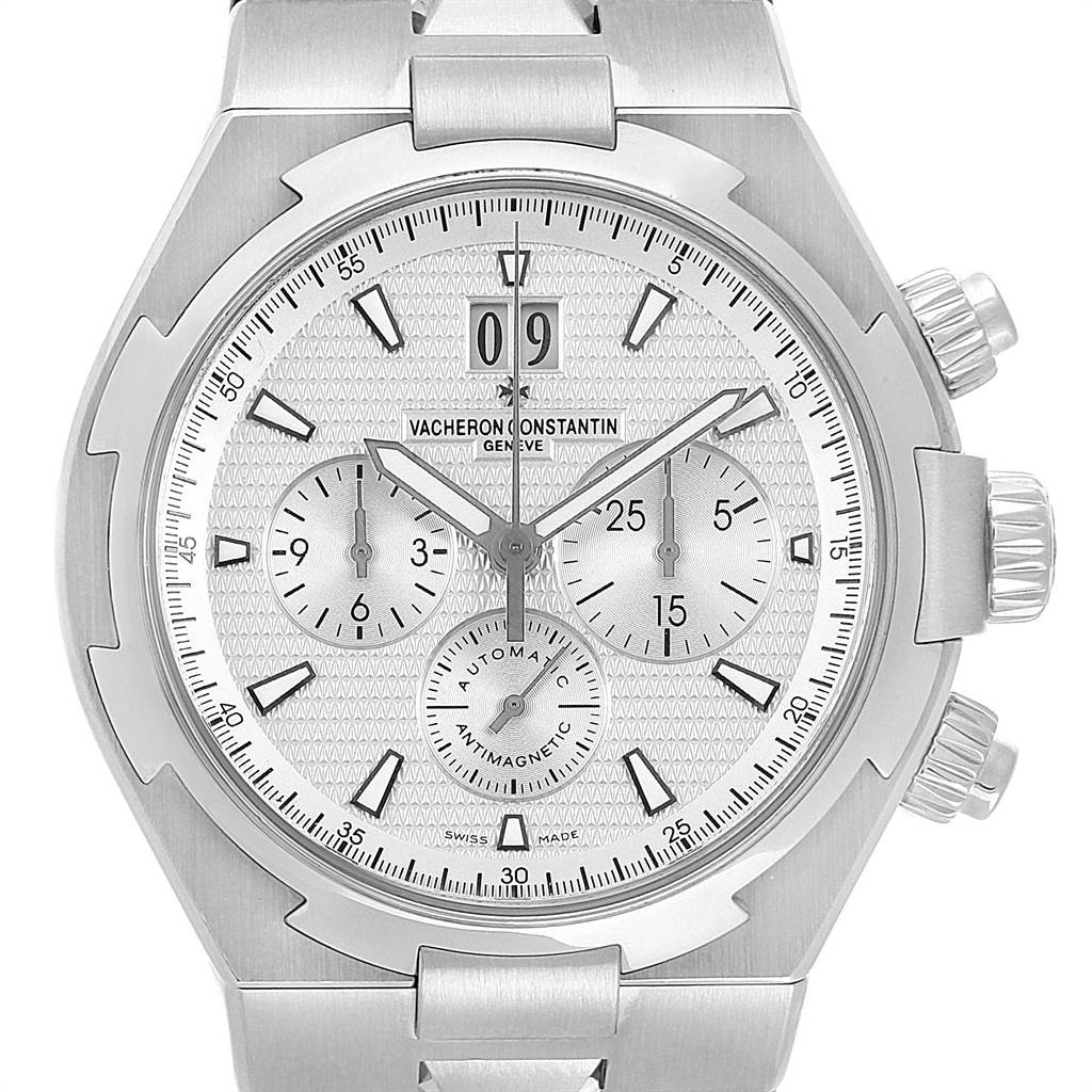 The image shows a front view of the Vacheron Constantin Overseas 49150 Men's Stainless Steel Silver Dial 49150 Men's Stainless Steel Silver Dial watch, displaying its face, dial, and chronograph features.