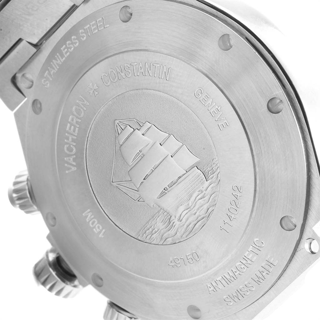 The image shows the stainless steel case back of a Vacheron Constantin Overseas 49150 Men's Stainless Steel Silver Dial 49150 Men's Stainless Steel Silver Dial watch, featuring an engraved ship design.