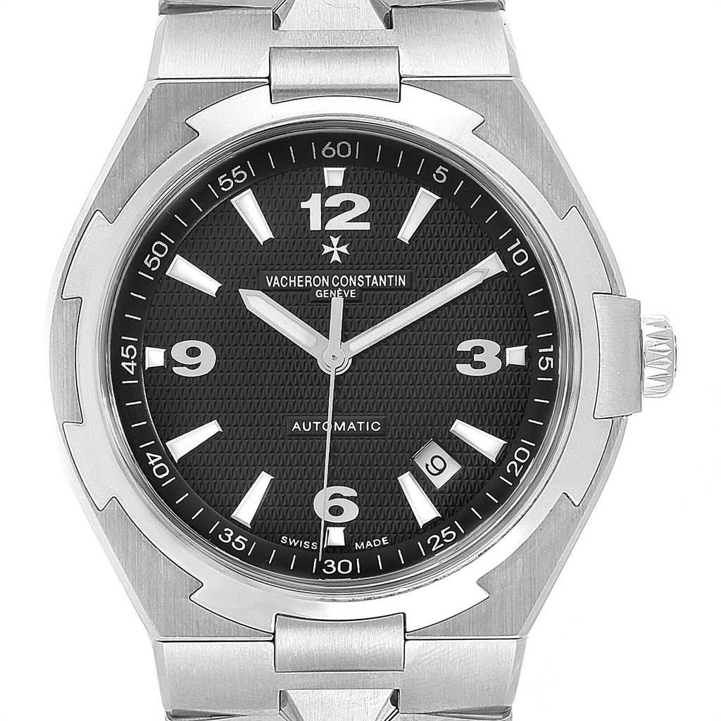 The image shows a frontal view of a Vacheron Constantin Overseas 47040/B01A-9094 Men's Stainless Steel Black Dial 47040/B01A-9094 Men's Stainless Steel Black Dial model watch, highlighting the face, bezel, and part of the bracelet.