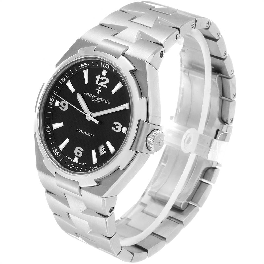 The Vacheron Constantin Overseas 47040/B01A-9094 Men's Stainless Steel Black Dial 47040/B01A-9094 Men's Stainless Steel Black Dial model watch is shown from a three-quarter angle, displaying its face, bracelet, and crown.
