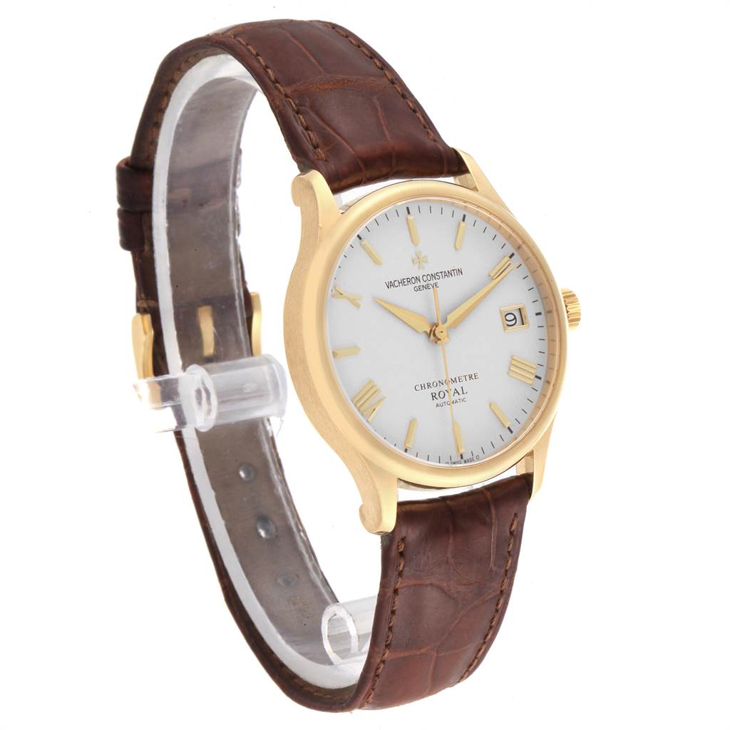 A Vacheron Constantin Patrimony VACHERON CONSTANTIN Men's Yellow Gold Silver Dial VACHERON CONSTANTIN Men's Yellow Gold Silver Dial watch angled from the side, showing the dial, crown, and brown leather strap.