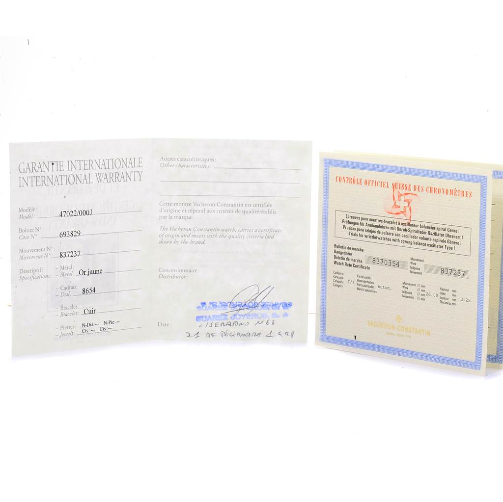 The image shows the international warranty card and chronometer certificate for the Vacheron Constantin Patrimony VACHERON CONSTANTIN Men's Yellow Gold Silver Dial VACHERON CONSTANTIN Men's Yellow Gold Silver Dial model watch.
