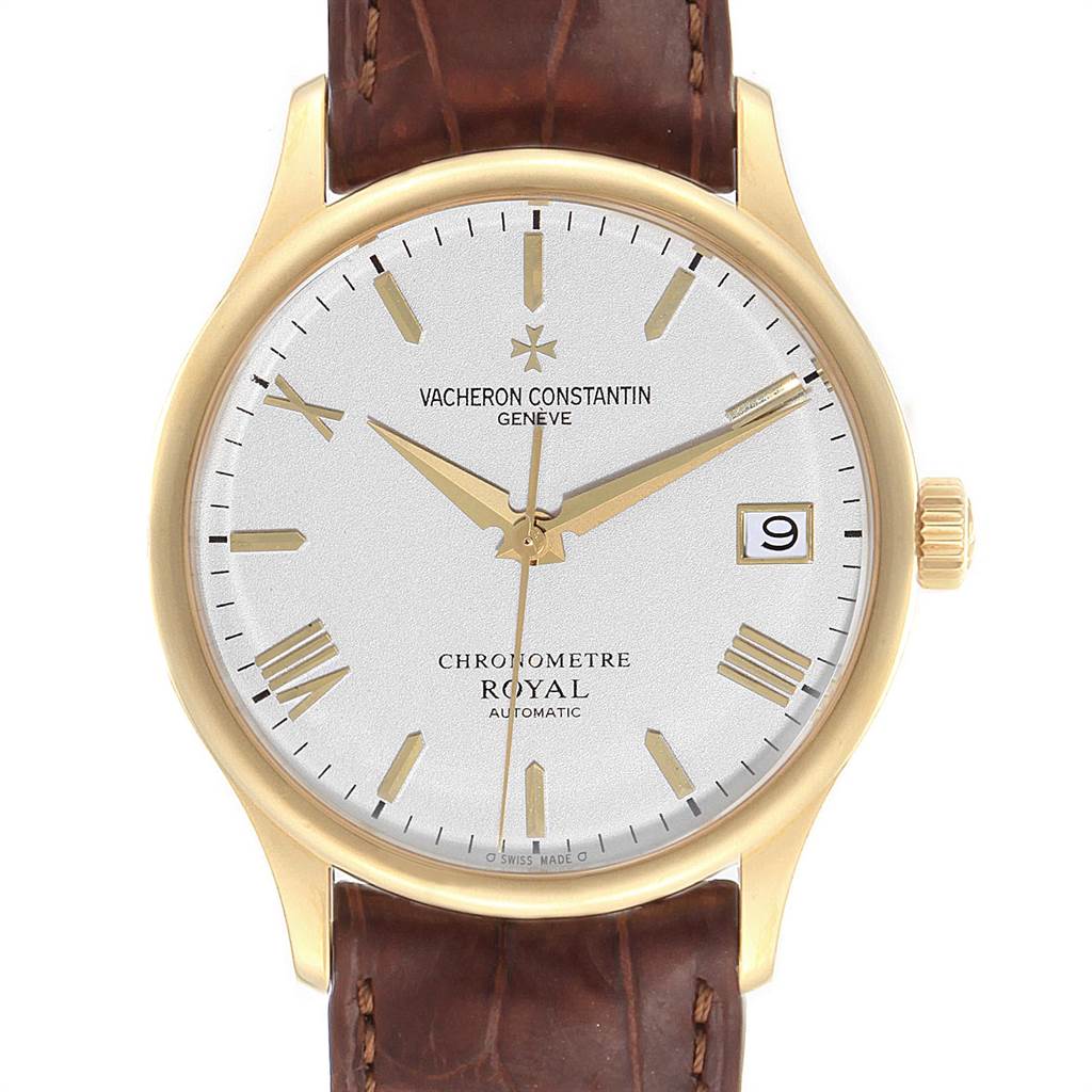 The image shows a frontal view of a Vacheron Constantin Patrimony VACHERON CONSTANTIN Men's Yellow Gold Silver Dial VACHERON CONSTANTIN Men's Yellow Gold Silver Dial model watch, highlighting the dial, hands, date window, and crown.
