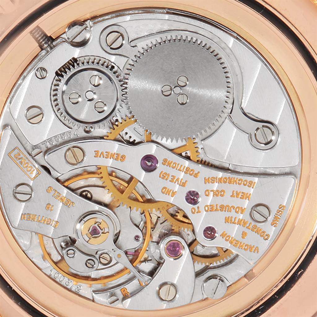 This is a close-up view of the movement inside a Vacheron Constantin Patrimony 33093 Men's Rose Gold White Dial 33093 Men's Rose Gold White Dial watch, showcasing its intricate gears and engineering.