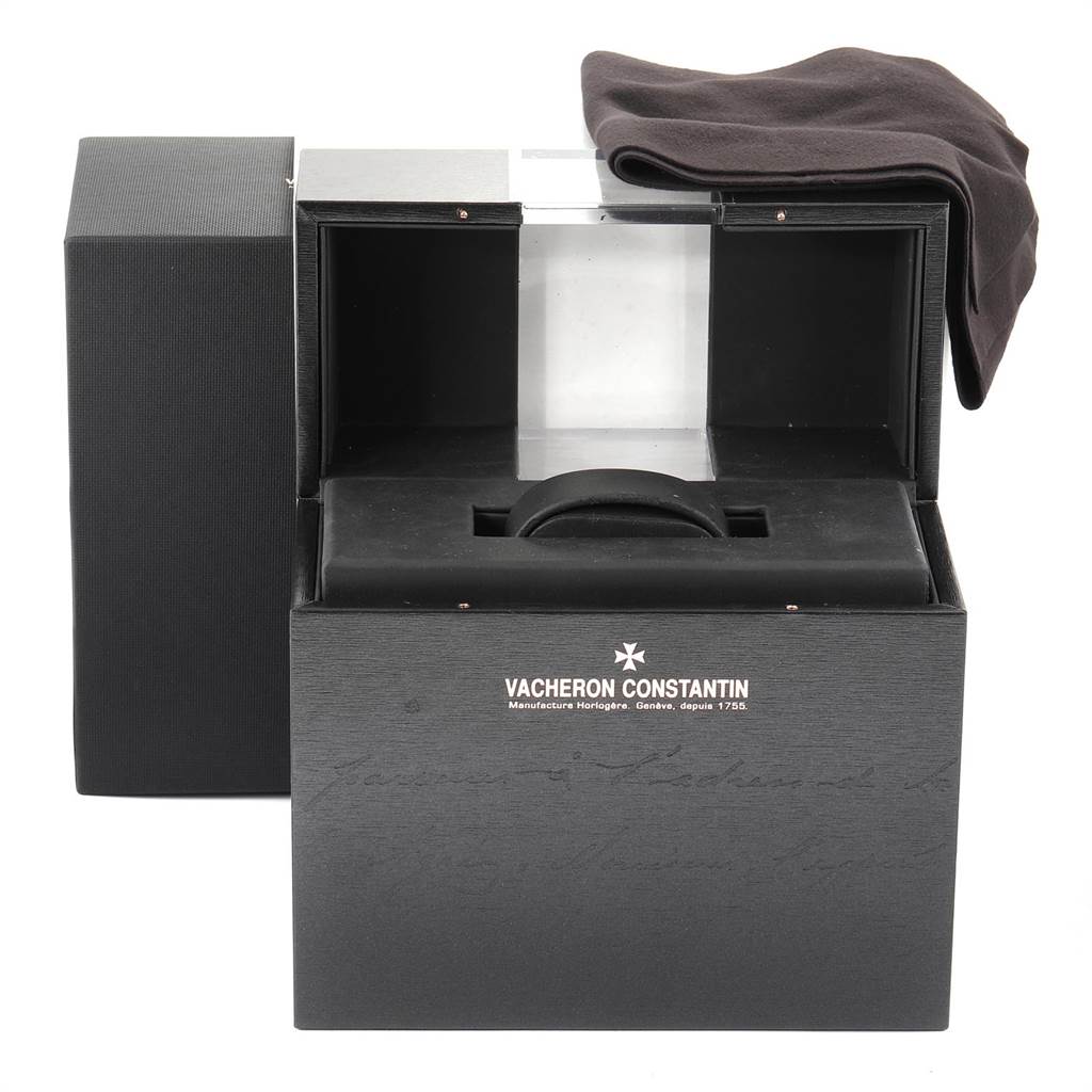 The image shows the open box of an Overseas model by Vacheron Constantin, including the inner packaging and a cloth.