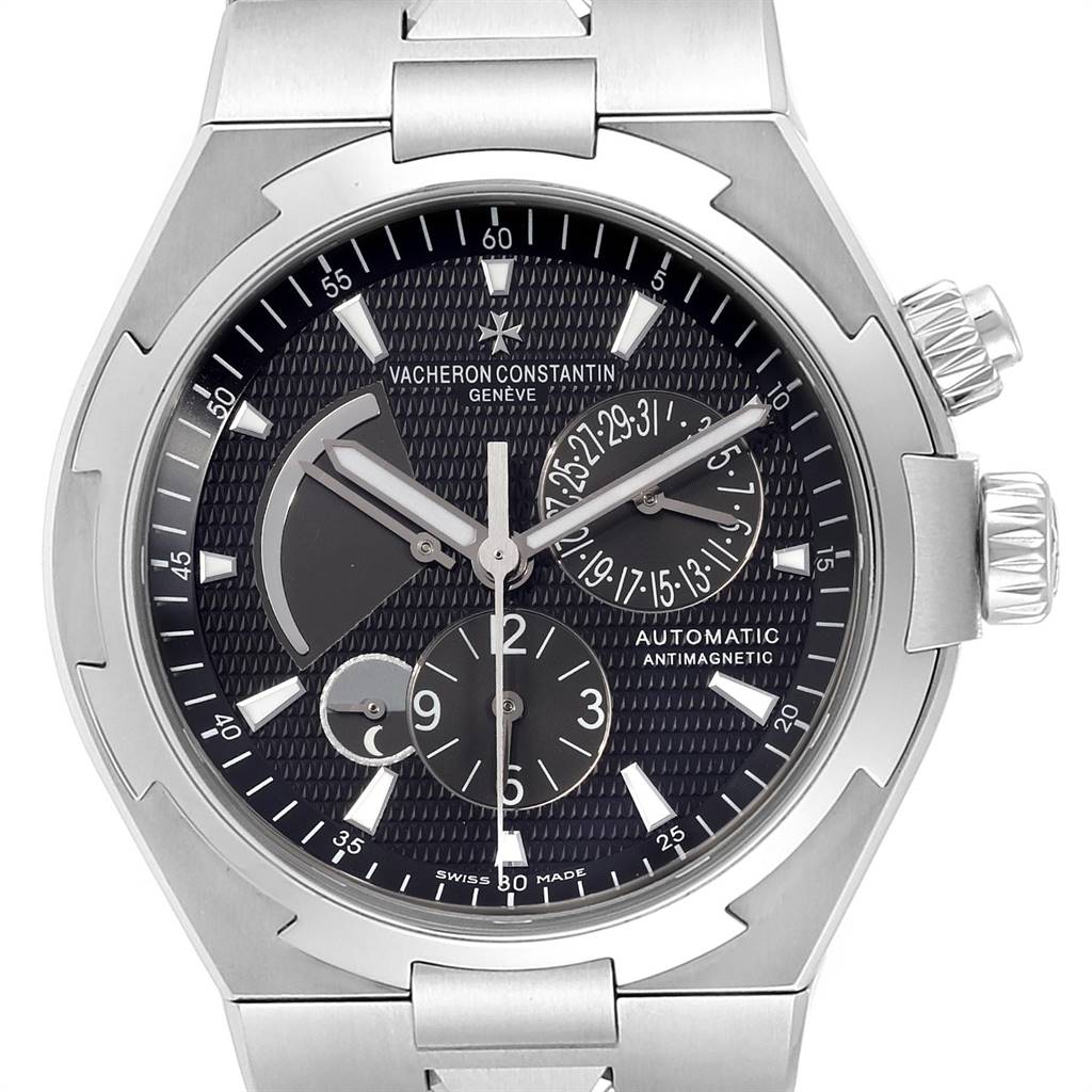 This image shows a frontal view of the Vacheron Constantin Overseas 47450/B01A-9227 Men
s Stainless Steel Black Dial 47450/B01A-9227 Men
s Stainless Steel Black Dial model watch, highlighting its dial, hands, subdials, and crown.