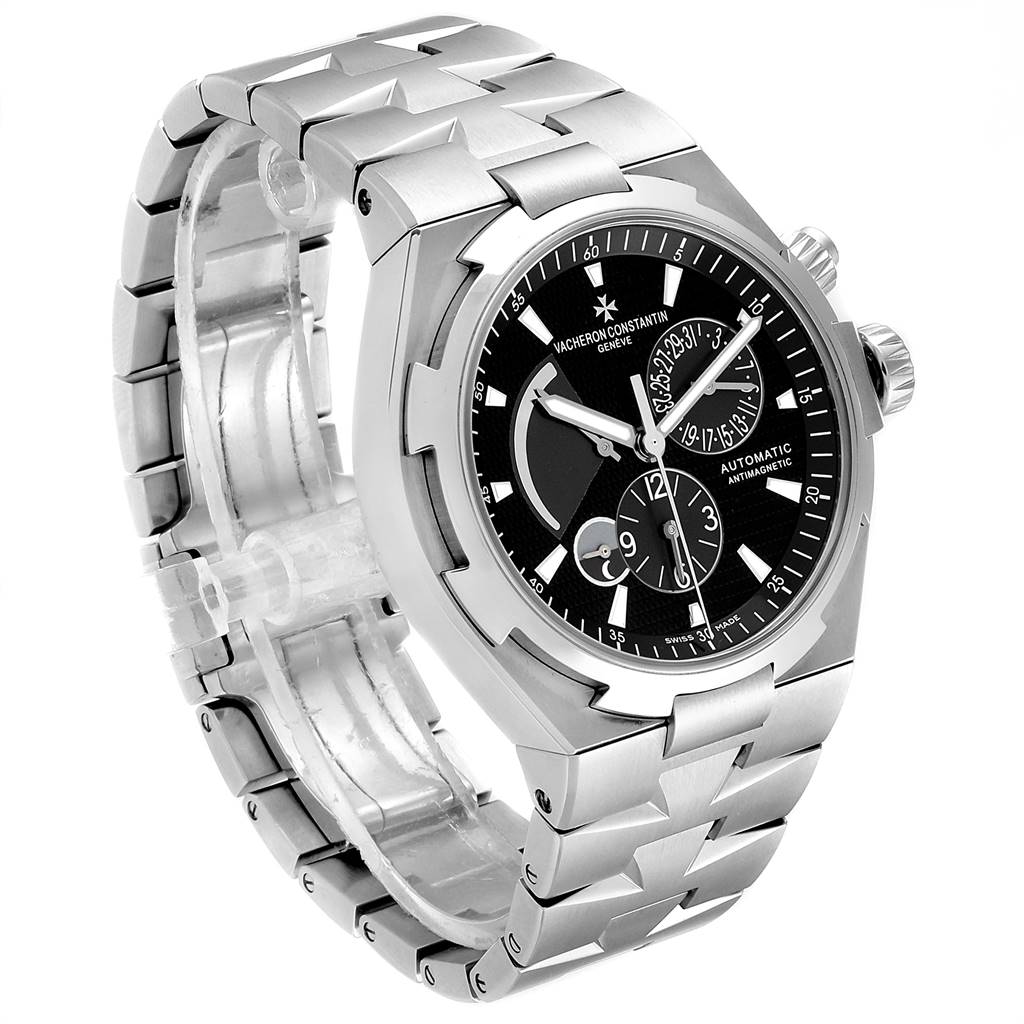 The Vacheron Constantin Overseas 47450/B01A-9227 Men
s Stainless Steel Black Dial 47450/B01A-9227 Men
s Stainless Steel Black Dial watch is shown at a three-quarter angle, displaying the dial, case, bracelet, and crown.