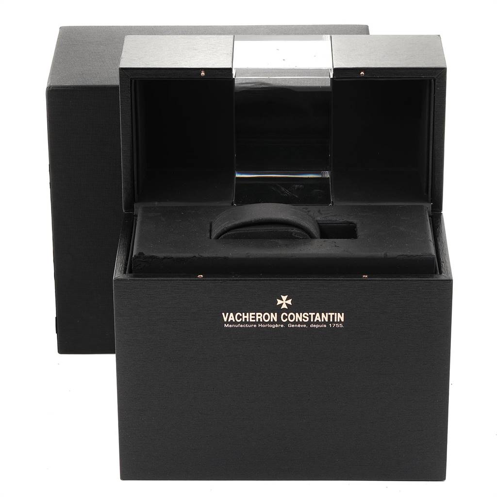 The image shows an open Vacheron Constantin Overseas 47450/B01A-9227 Men
s Stainless Steel Black Dial 47450/B01A-9227 Men
s Stainless Steel Black Dial watch box from the front, displaying the interior compartments.