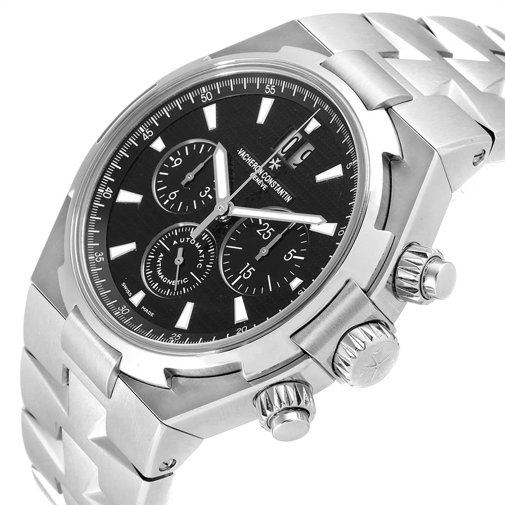 This Vacheron Constantin Overseas 49150.B01A.9097 Men's Stainless Steel Black Dial 49150.B01A.9097 Men's Stainless Steel Black Dial watch is shown from an angled view, highlighting the dial and chronograph pushers.