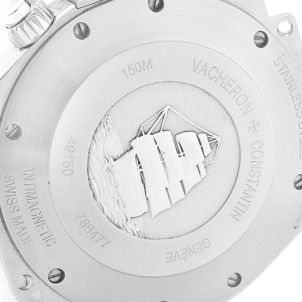 The image shows the case back of the Vacheron Constantin Overseas 49150.B01A.9097 Men's Stainless Steel Black Dial 49150.B01A.9097 Men's Stainless Steel Black Dial watch, highlighting engravings and a ship motif.
