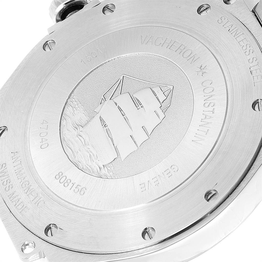 The image shows the stainless steel case back of a Vacheron Constantin Overseas 47040/B01A-9094 Men
s Stainless Steel Black Dial 47040/B01A-9094 Men
s Stainless Steel Black Dial watch, highlighting the engraved ship and specifications.