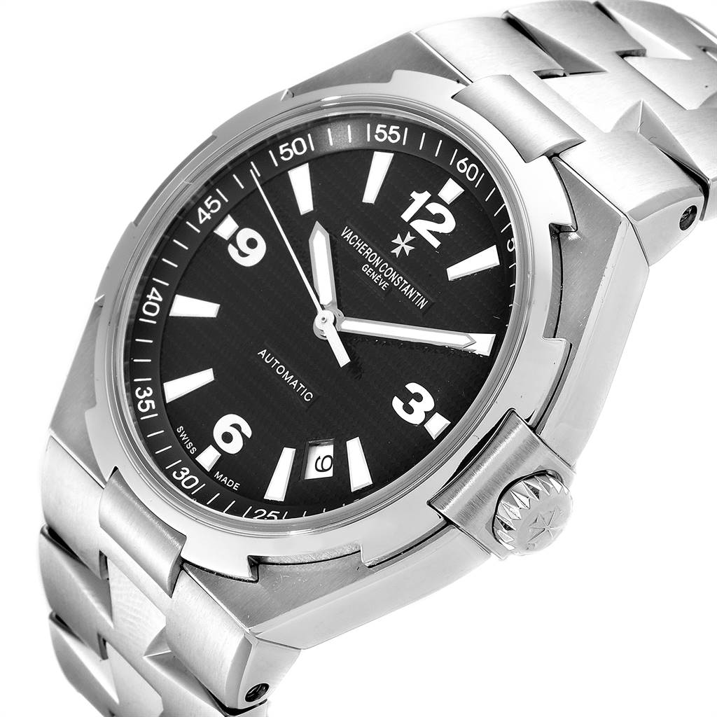The Vacheron Constantin Overseas 47040/B01A-9094 Men
s Stainless Steel Black Dial 47040/B01A-9094 Men
s Stainless Steel Black Dial watch is shown at an oblique angle, highlighting the face, crown, and part of the bracelet.