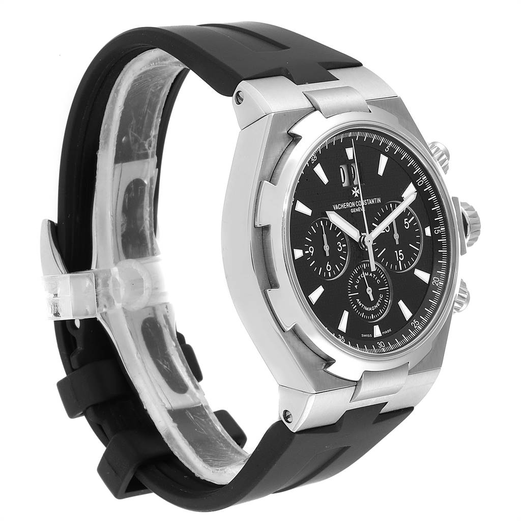 The image shows a side angle of the Vacheron Constantin Overseas 49150 Men's Stainless Steel Black Dial 49150 Men's Stainless Steel Black Dial watch, highlighting the bezel, dial, and strap.