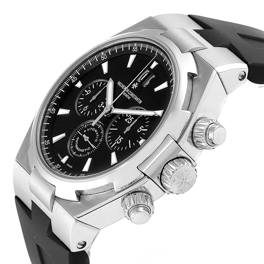 This image shows a side angle view of the Vacheron Constantin Overseas 49150 Men's Stainless Steel Black Dial 49150 Men's Stainless Steel Black Dial model, highlighting the crown, pushers, and part of the strap.