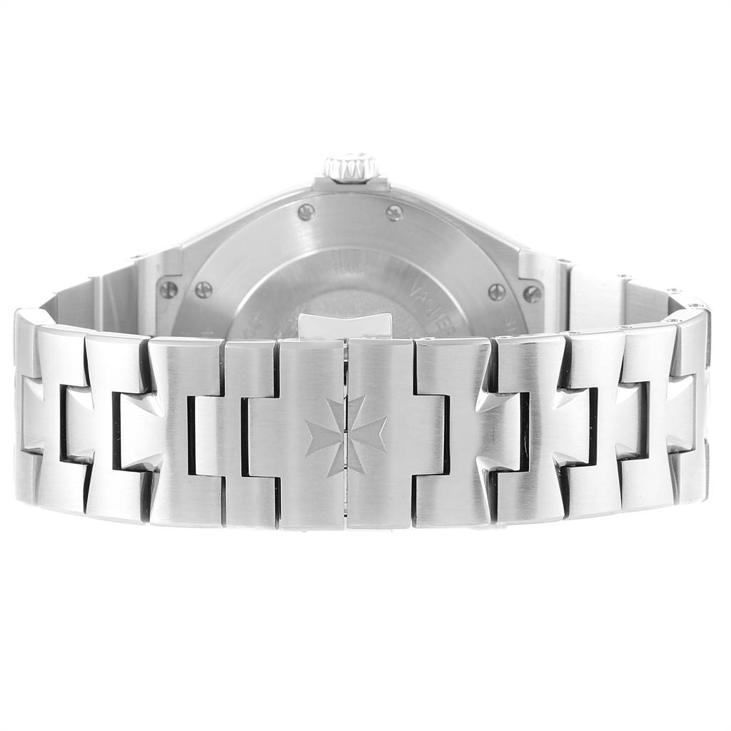 The image shows the back case and bracelet of the Vacheron Constantin Overseas 47040B01A-9093 Men's Stainless Steel Silver Dial 47040B01A-9093 Men's Stainless Steel Silver Dial watch, focusing on the clasp with the brand's emblem.