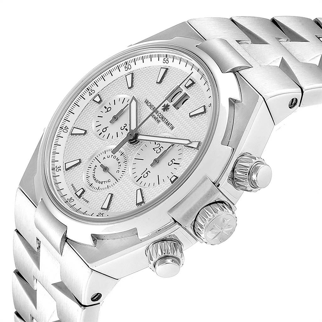 The image shows a Vacheron Constantin Overseas 49150 Men's Stainless Steel Silver Dial 49150 Men's Stainless Steel Silver Dial watch at a three-quarter angle, highlighting its face, crown, and part of the band.