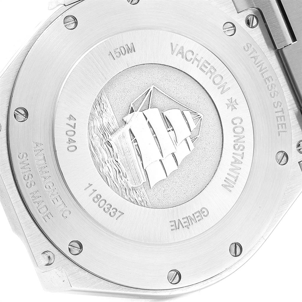 This image shows the engraved caseback of the Vacheron Constantin Overseas 47040B01A-9093 Men's Stainless Steel Silver Dial 47040B01A-9093 Men's Stainless Steel Silver Dial watch, featuring a sailboat design and brand details.