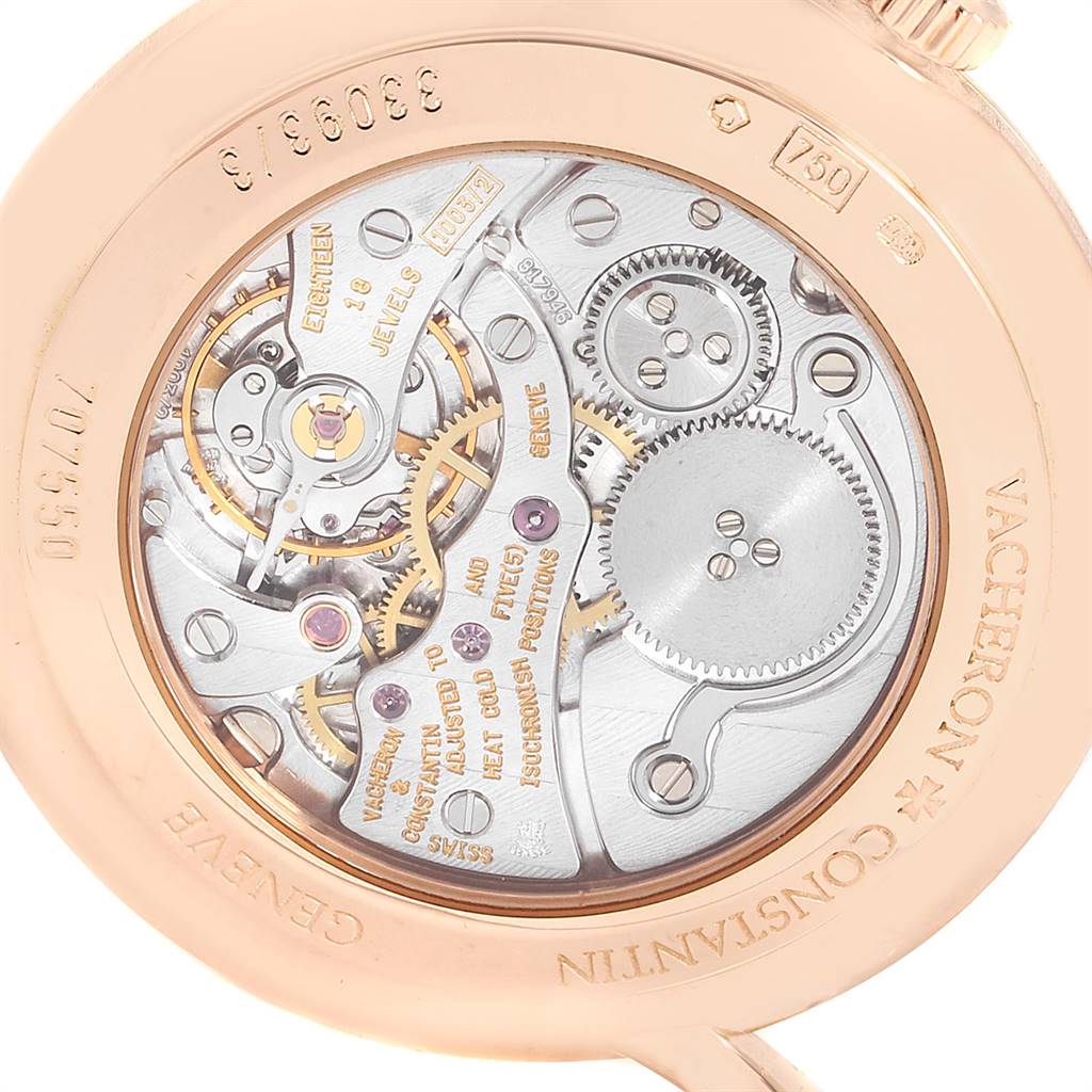 The image shows the back view of a Vacheron Constantin Patrimony 33093/3 Men's Rose Gold White Dial 33093/3 Men's Rose Gold White Dial watch, highlighting its intricate movement and components.