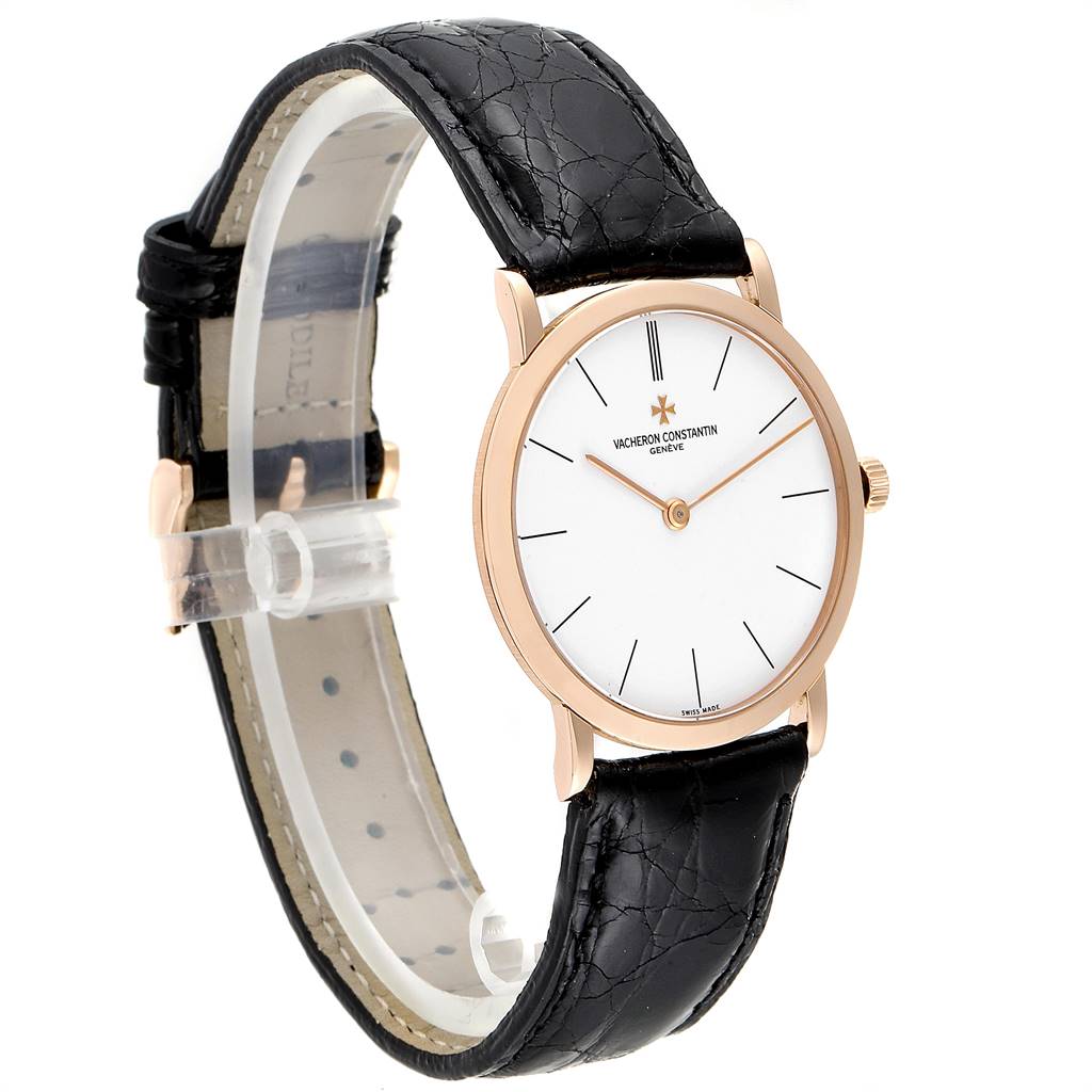 The Vacheron Constantin Patrimony 33093/3 Men's Rose Gold White Dial 33093/3 Men's Rose Gold White Dial watch is shown at a three-quarter angle, displaying the face, case, crown, and black leather strap.