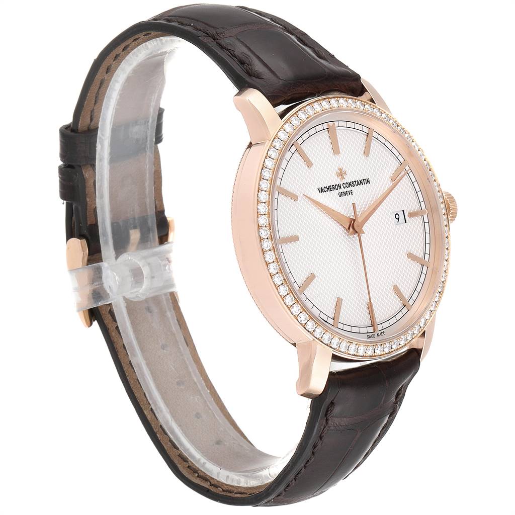 This image shows a side angle of a Vacheron Constantin Traditionnelle 85520/000R-9850 Men
s Rose Gold Pink Dial 85520/000R-9850 Men
s Rose Gold Pink Dial watch with a leather strap and a diamond-set bezel.