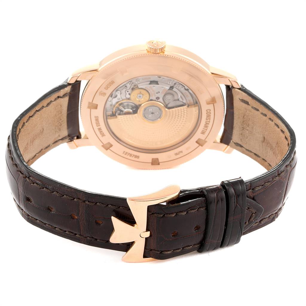 The image shows the back view of the Traditionnelle model by Vacheron Constantin, highlighting the movement and leather strap.
