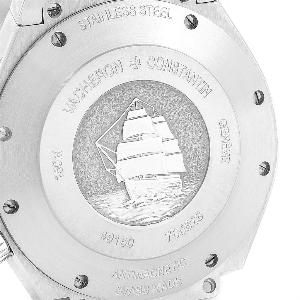The image shows the engraved case back of a Vacheron Constantin Overseas 49150 Men's Stainless Steel Silver Dial 49150 Men's Stainless Steel Silver Dial watch, highlighting its antimagnetic and stainless steel features.