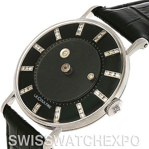 This image shows a Jaeger LeCoultre Vintage White Gold Black Dial White Gold Black Dial watch at an angle, highlighting the black dial, diamond markers, and leather strap.