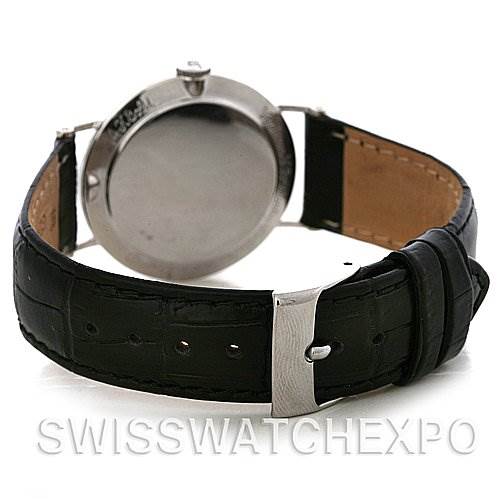 The image shows the back view of a Vintage Jaeger LeCoultre watch, highlighting the case back and leather strap with buckle.