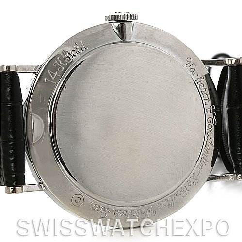 The image shows the back case, lugs, and crown of a vintage Jaeger LeCoultre watch.