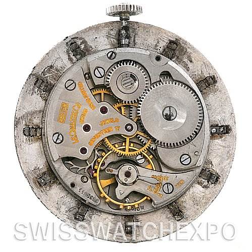 This image shows a close-up view of the vintage Jaeger LeCoultre watch movement, highlighting gears and internal mechanisms.