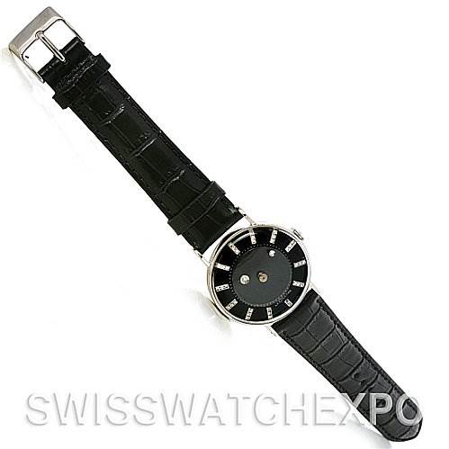 This image shows a Jaeger LeCoultre Vintage White Gold Black Dial White Gold Black Dial watch at an angle displaying the full face, leather strap, and buckle.