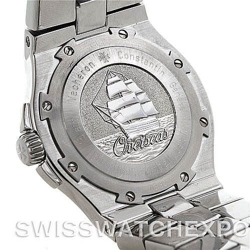 The Vacheron Constantin Overseas 42042 Men's Stainless Steel Silver Dial 42042 Men's Stainless Steel Silver Dial watch is shown from the back, displaying the engraved case back with a sailboat design.