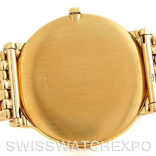 This image shows the back of a Vacheron Constantin Vintage 33003 Men's Yellow Gold Champagne Dial 33003 Men's Yellow Gold Champagne Dial watch, highlighting its gold case and bracelet.