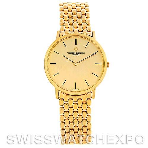 The image shows a front view of a Vintage Vacheron Constantin watch with a gold dial and matching gold bracelet.