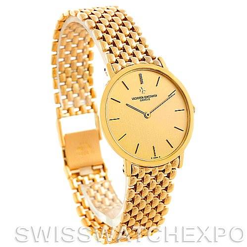 The image shows a Vintage Vacheron Constantin watch, highlighting its gold dial, case, and mesh bracelet from a frontal angle.