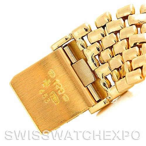 This image shows the clasp and part of the gold bracelet of a vintage Vacheron Constantin watch from a close-up angle.