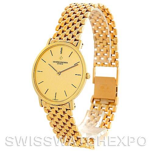 The image shows a Vintage Vacheron Constantin watch at a three-quarter angle, highlighting the gold face, hands, and bracelet.