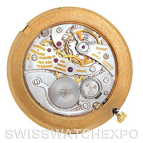 This image shows the intricate inner mechanics of a Vintage Vacheron Constantin watch taken from a top-down angle.