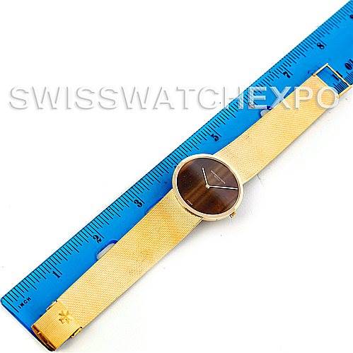 This image shows a full frontal view of the Vintage Vacheron Constantin watch, including its entire strap and dial placed next to a ruler for scale.