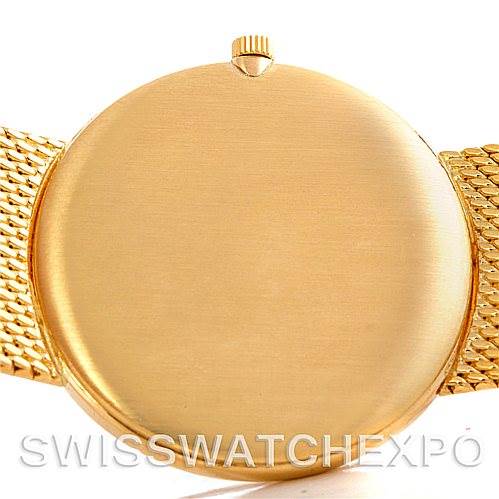 This image shows the back case and part of the band of a Vintage Vacheron Constantin watch from a rear angle.