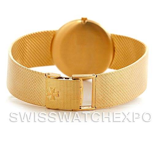 This image shows the back view of a vintage Vacheron Constantin watch, highlighting its textured gold bracelet and clasp.