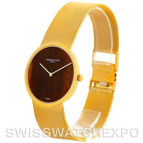 The image shows a side angle of the Vintage Vacheron Constantin watch, highlighting its gold mesh strap and minimalist dial.