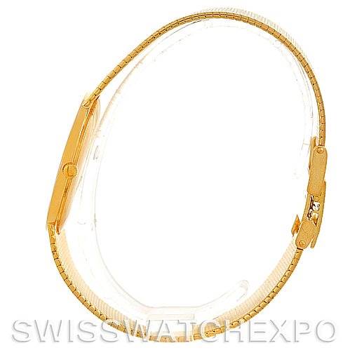 This image shows the side profile of a Vintage Vacheron Constantin watch, highlighting its slim gold case and strap.